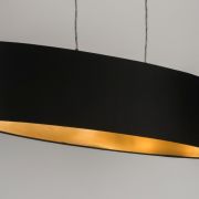 Colgante ovalado negro y dorado