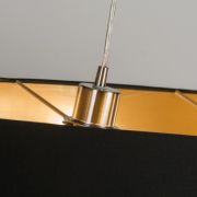 Colgante ovalado negro y dorado